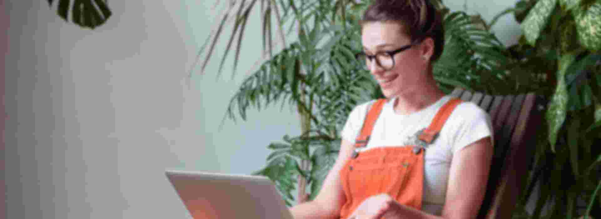 Young woman looking at a laptop