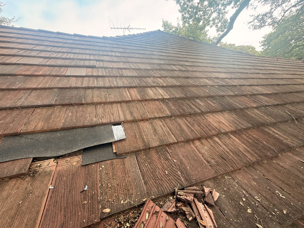 missing and broken clay tiles on a historic roof dallas fort worth tx