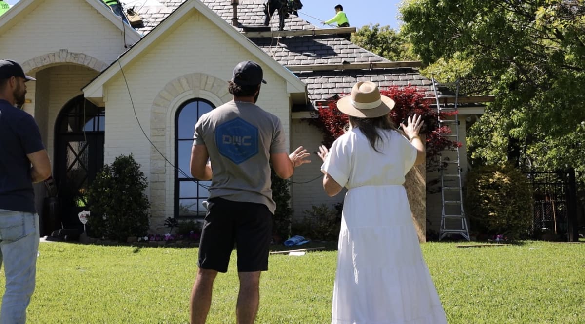 Daryl with homeowners at a job site