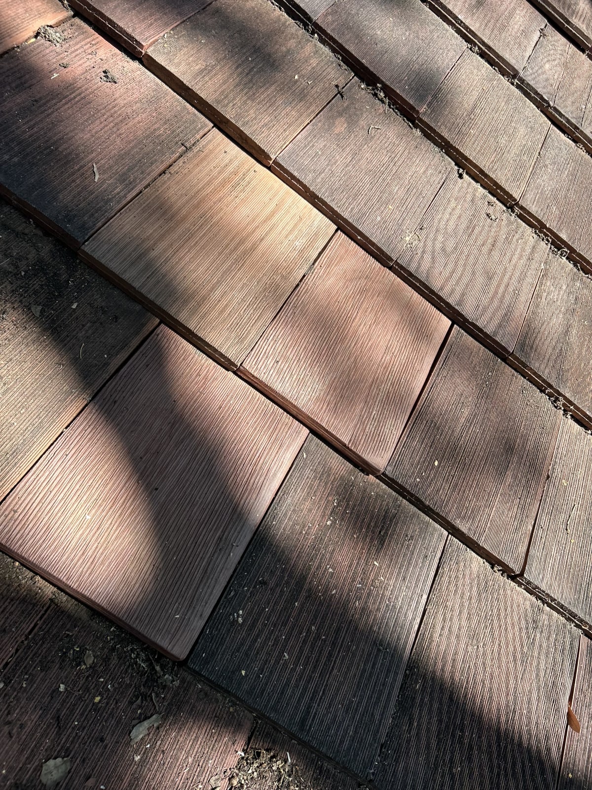 close-up of ludowici shake-profile terra cotta tile surface on a westover hills estate roof