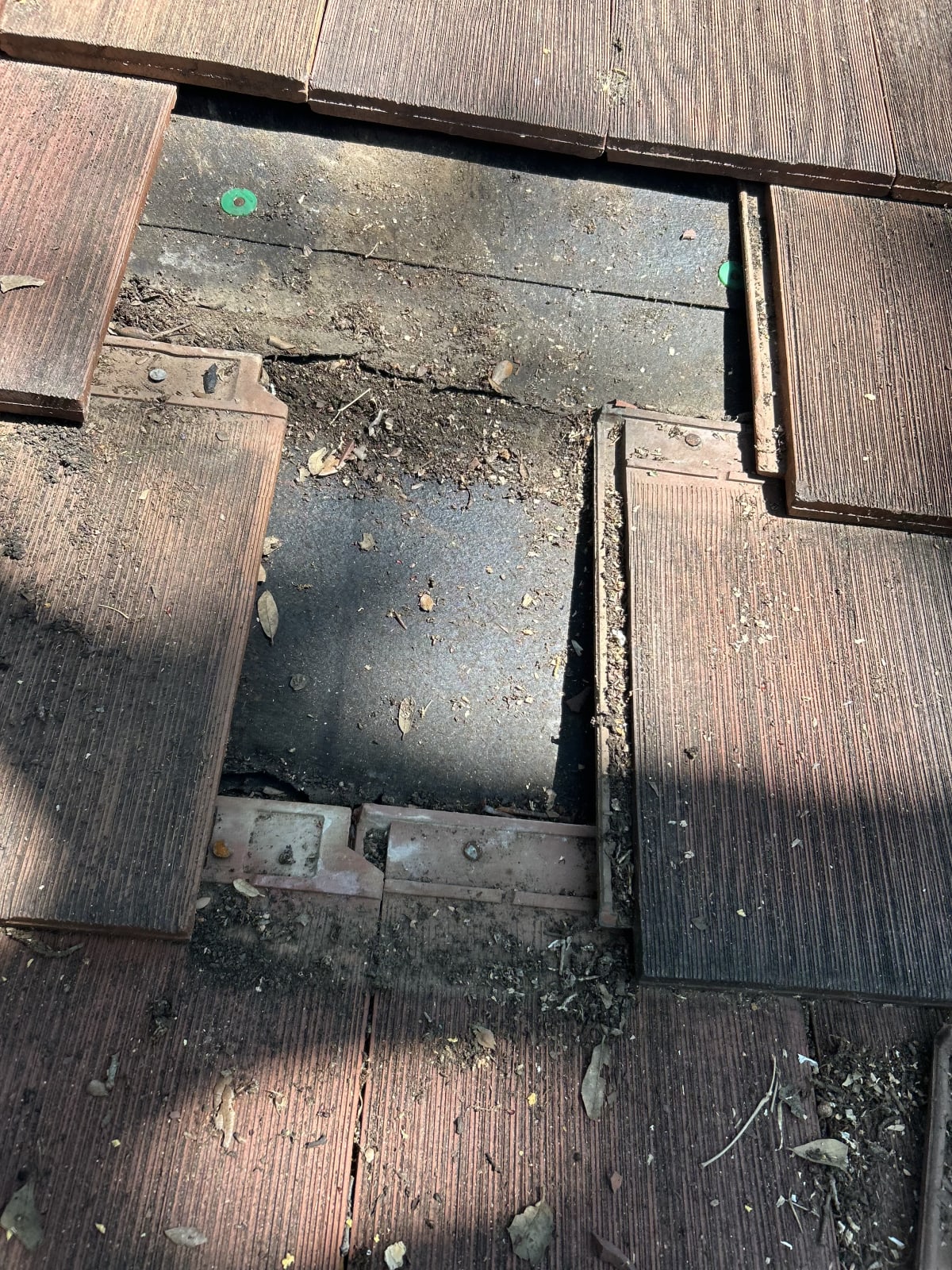 broken and missing clay tiles found during an estate roof inspection