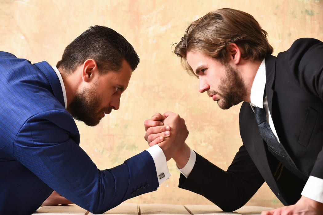 same business as employer arm wrestling