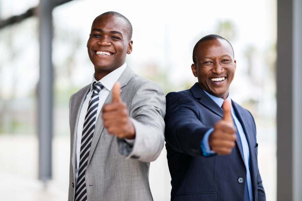 men extending hands
