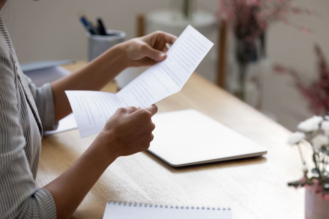 woman reading sales letter