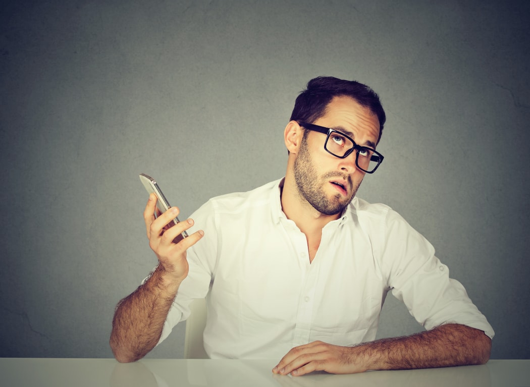 man annoyed with follow-up call