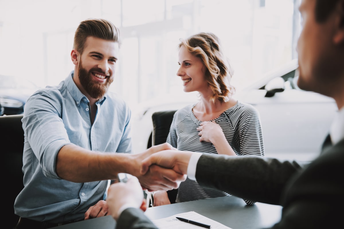 bearded man shaking hands