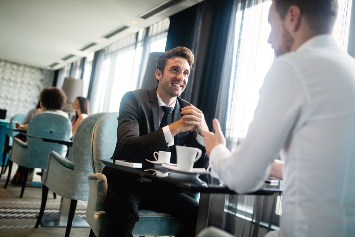 business men having coffee