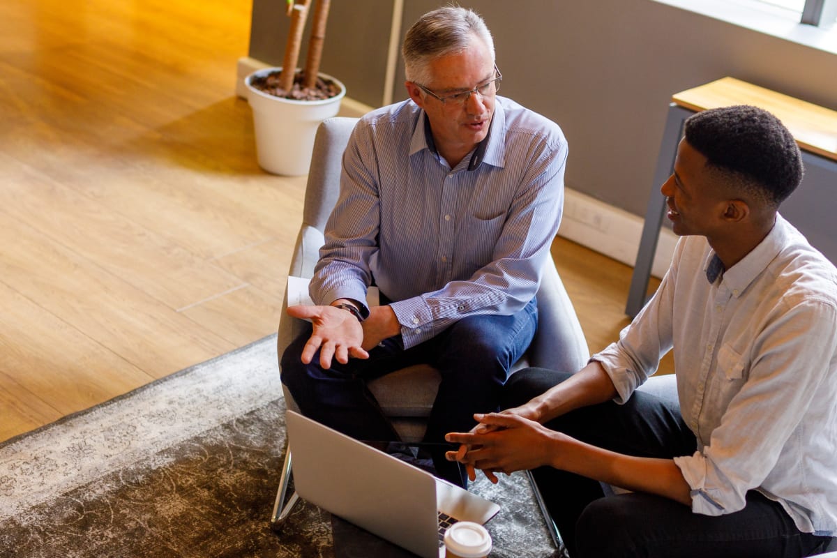 business professional explaining what a registered agent does