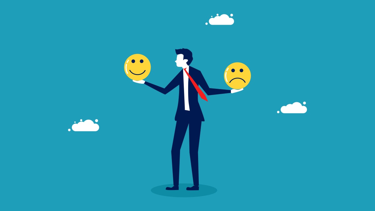 businessman weighing happy and sad