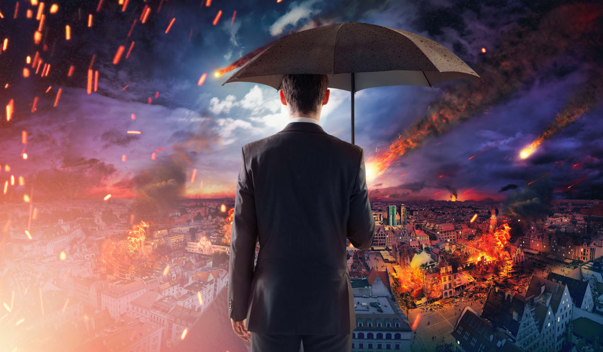businessman surveying disaster