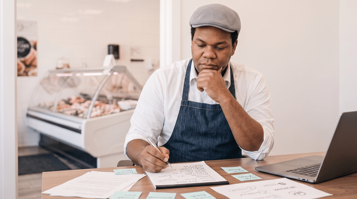 Butcher shop business owner brainstorming business name ideas