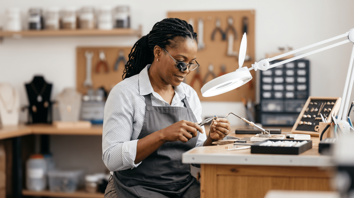 Jewelry repair owner working on their new business idea