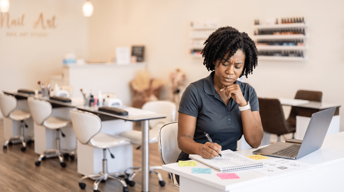 Nail art studio owner brainstorming business name ideas
