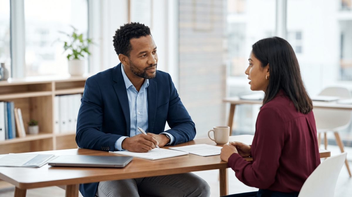 Recruiting agency owner collaborating with their team to source and place job candidates for clients