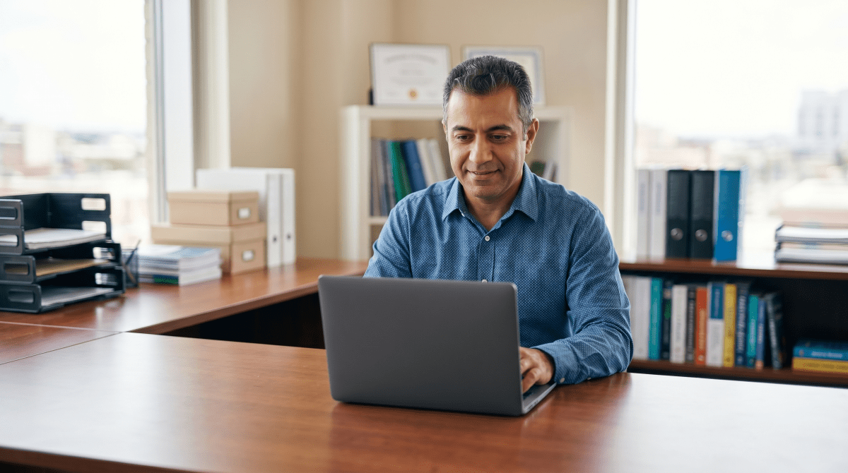 SEO agency owner registering an SEO business as an LLC on laptop