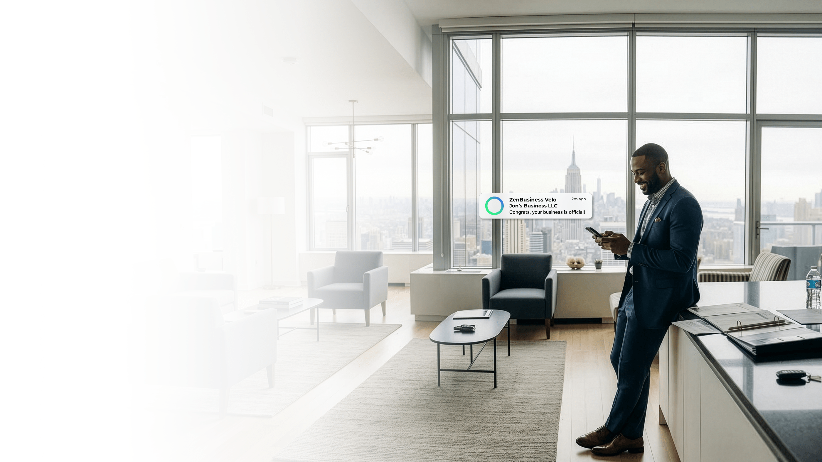 Male consultant reviewing his ZenBusiness Velo notification confirming his New York LLC is official in a Manhattan high-rise office overlooking the city skyline