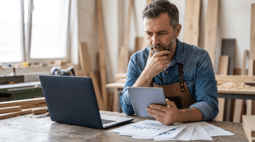 Business owner reviewing Harvard Business LLC services