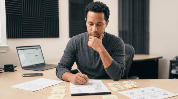 Video production company owner brainstorming LLC business names