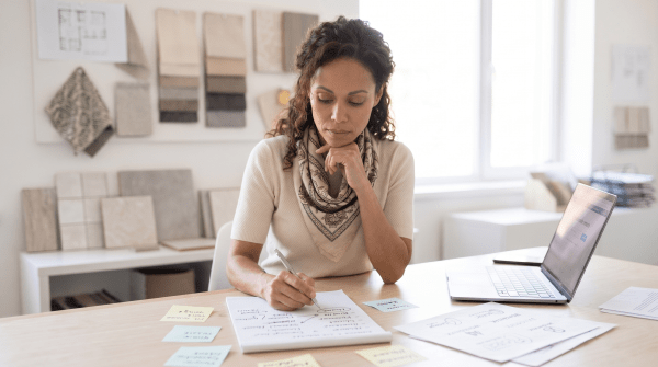 Interior design business owner brainstorming LLC name ideas
