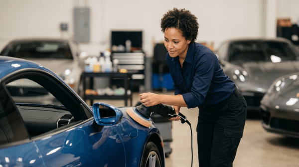 Luxury and exotic car rental business owner showcasing high-end rental vehicles for customers
