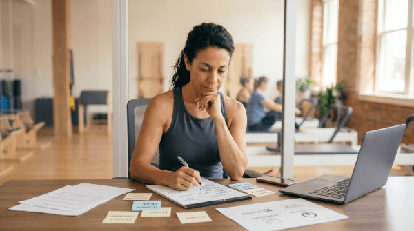 Pilates instructor naming a Pilates studio