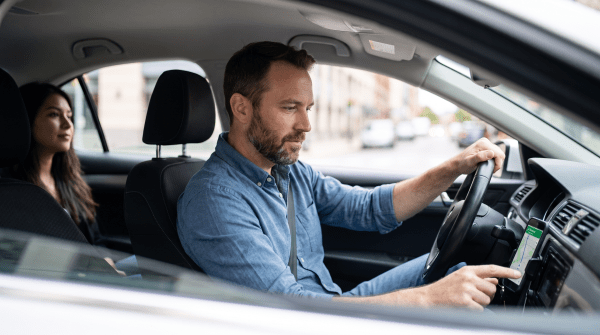 Rideshare and taxi service owner working on their business