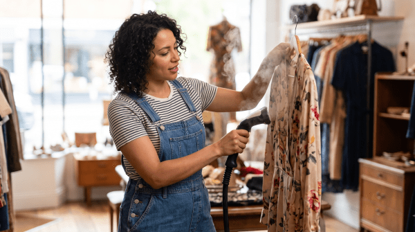 Vintage clothing store owner running a vintage clothing store