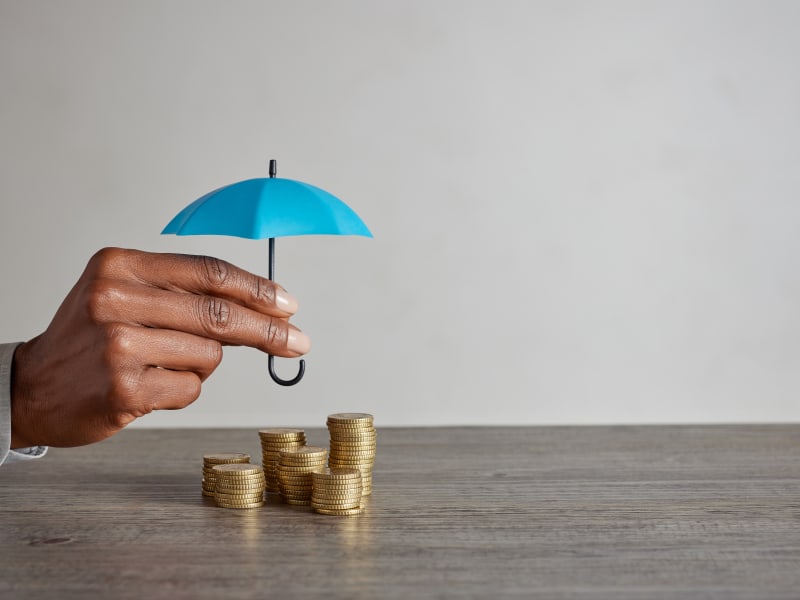 umbrella over coins