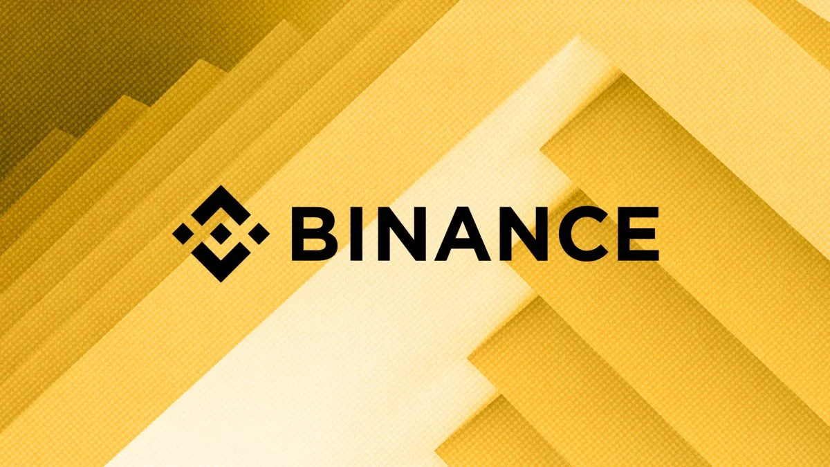 Binance logo against a backdrop of the Russian flag, symbolizing the delisting decision.