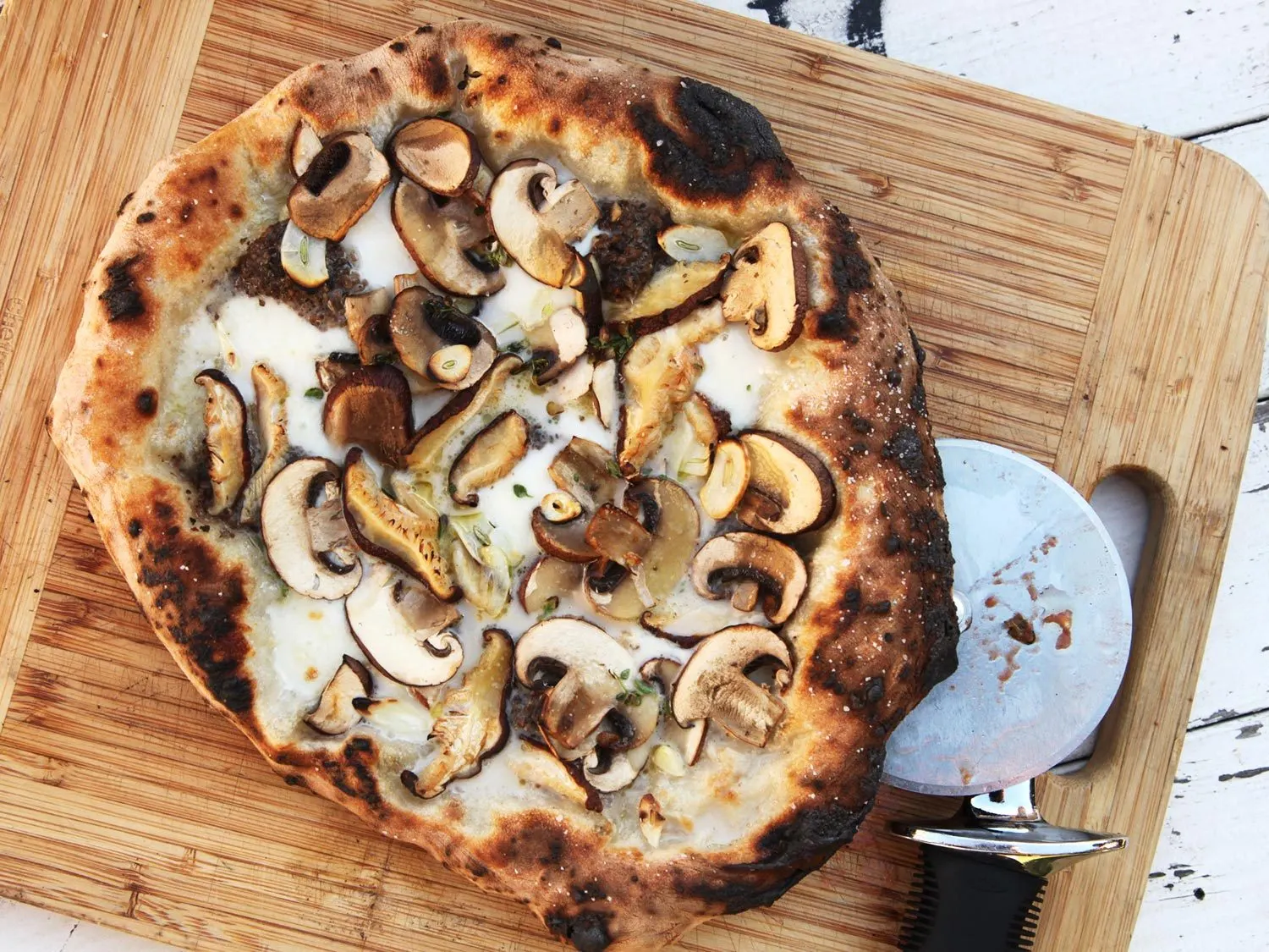 Wild Mushroom & Truffle Oil Thin Crust Pizza Wild Mushroom & Truffle Oil Thin Crust Pizza