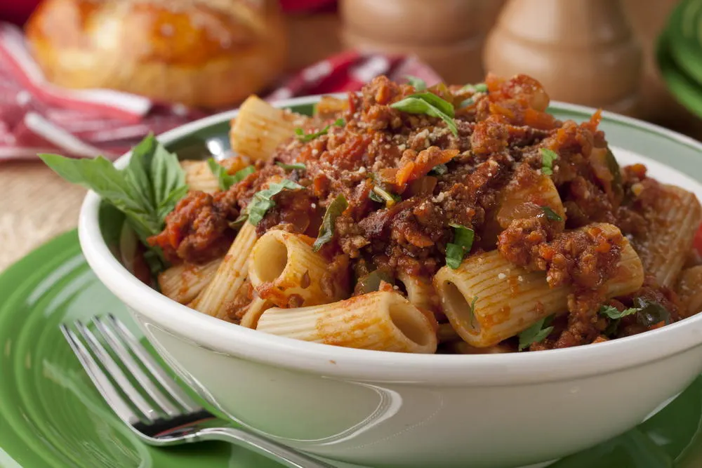 Rigatoni Bolognese with Garlic Bread and Caesar Salad