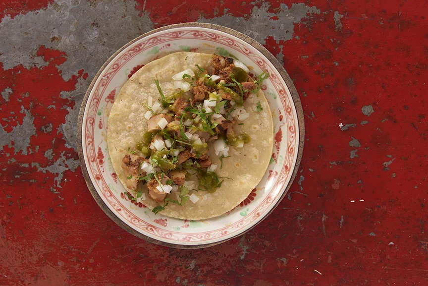 Pollo Tacos with Tomatilla Salsa and Roasted Corn Salad