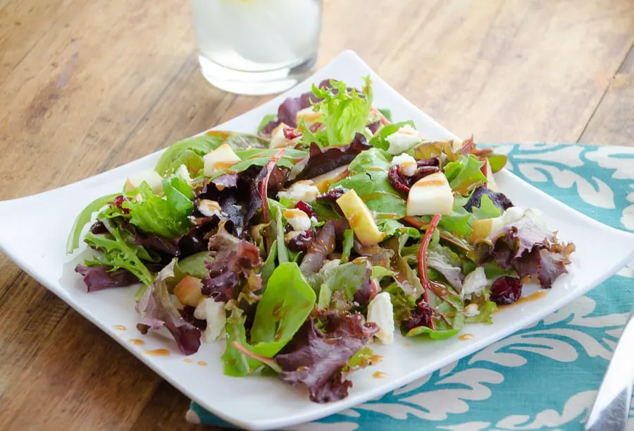 Individually Packaged: Green Spring Mix with Acai Pomegranate vinaigrette.
