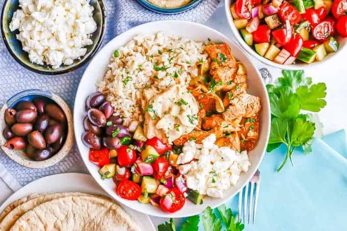 Chicken Shawarma Rice Bowl with White Pita Chicken Shawarma Rice Bowl with White Pita