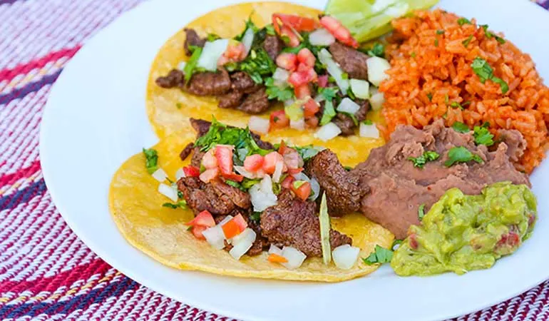 Pork Al Pastor Street Tacos with Refried Beans, Rice and Salsa