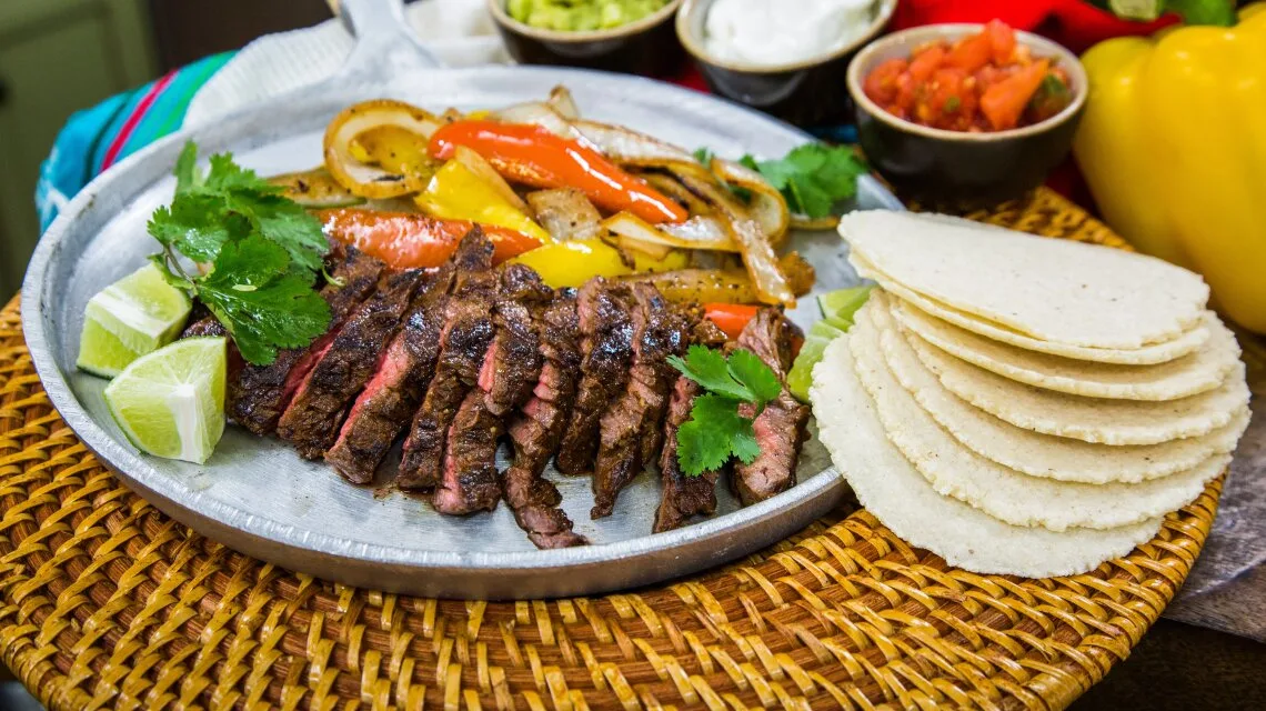 Beef Fajitas with Flour Tortilla, Yellow Rice & Black Beans (Sour Cream, Salsa) Beef Fajitas with Flour Tortilla, Yellow Rice & Black Beans (Sour Cream, Salsa)