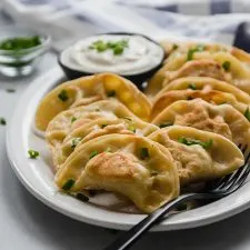 Mom's Fav Pierogi Lunchbox with Sauerkraut and Sour Cream & Chives Dip Mom's Fav Pierogi Lunchbox with Sauerkraut and Sour Cream & Chives Dip