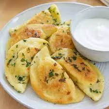 Spinach & Feta Pierogi Lunchbox with Sauerkraut and Sour Cream & Chives Dip Spinach & Feta Pierogi Lunchbox with Sauerkraut and Sour Cream & Chives Dip