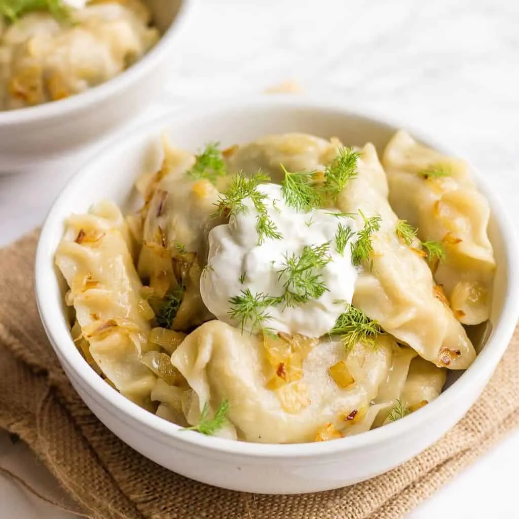 Vegan Jalapeño Pierogi Lunchbox with Sauerkraut and Vegan Onion Dip Vegan Jalapeño Pierogi Lunchbox with Sauerkraut and Vegan Onion Dip