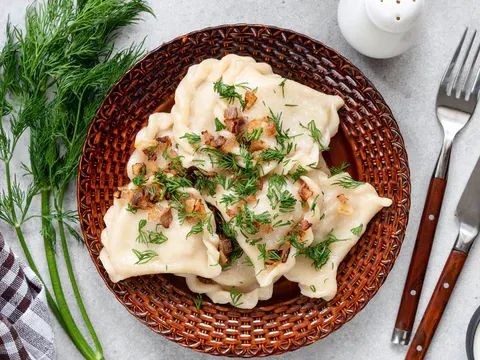 Vegan Sauerkraut Pierogi Lunchbox with Caramelized Onions and Vegan Horseradish Sauce Vegan Sauerkraut Pierogi Lunchbox with Caramelized Onions and Vegan Horseradish Sauce
