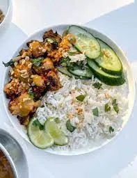 Thai Chicken Satay with White Rice and Cucumber Salad Thai Chicken Satay with White Rice and Cucumber Salad