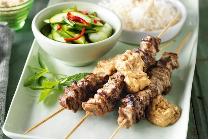 Thai Steak Satay with White Rice and Cucumber Salad Thai Steak Satay with White Rice and Cucumber Salad