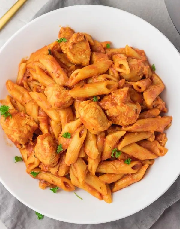Braised Chicken Thighs with Penne alla Vodka and Italian Roasted Vegetables Braised Chicken Thighs with Penne alla Vodka and Italian Roasted Vegetables
