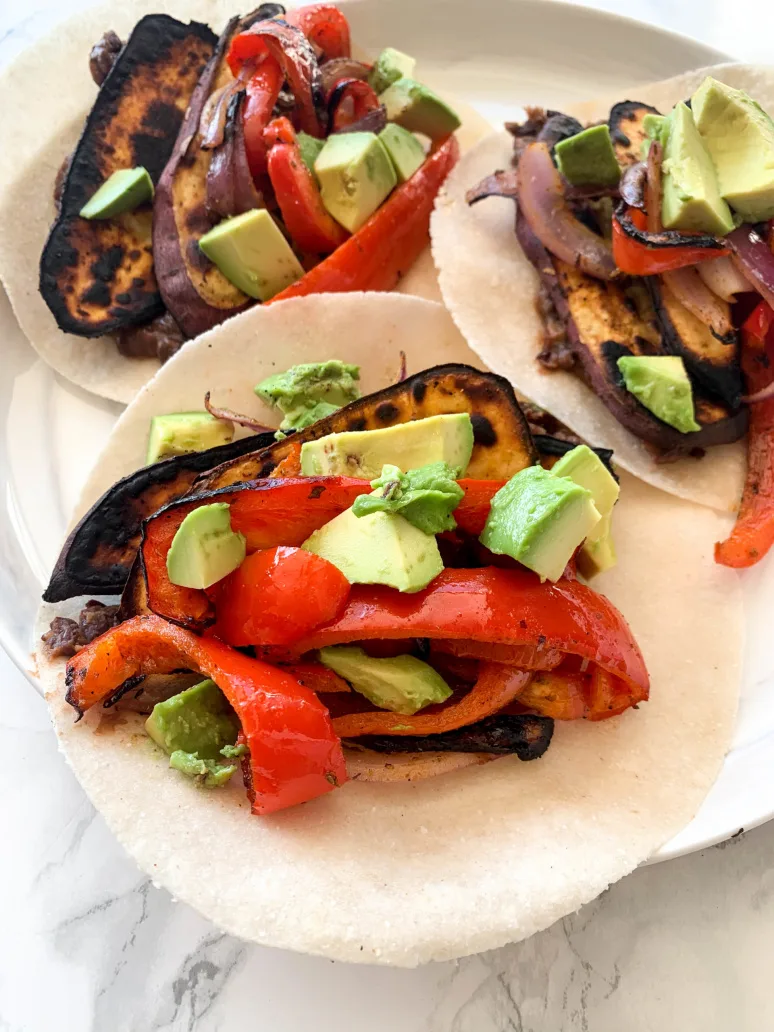 Eggplant Fajitas with Flour Tortilla, Yellow Rice & Black Beans (Sour Cream, Salsa) Eggplant Fajitas with Flour Tortilla, Yellow Rice & Black Beans (Sour Cream, Salsa)