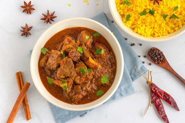 Goat Curry, Pulav Rice, Butter Naan & Dal Palak [22oz]