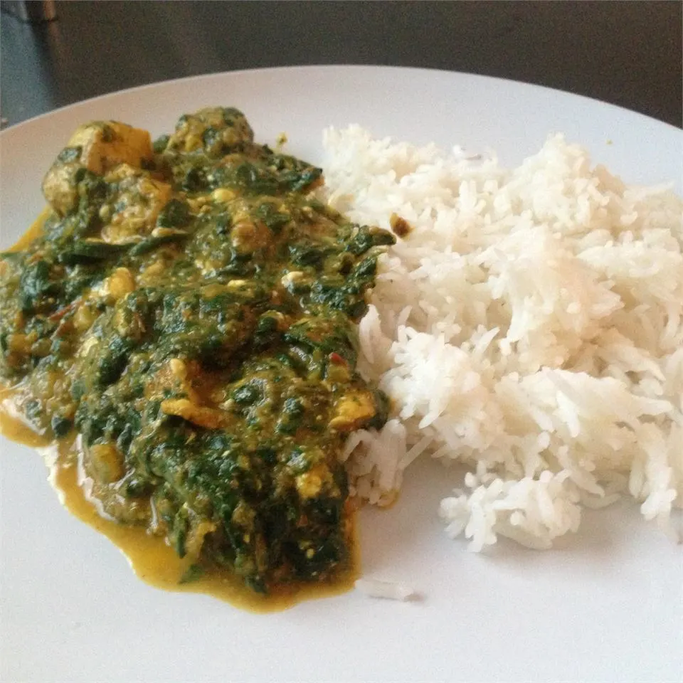 Saag Chicken, Steamed White Rice, Wheat Roti & Chana Masala [22oz]