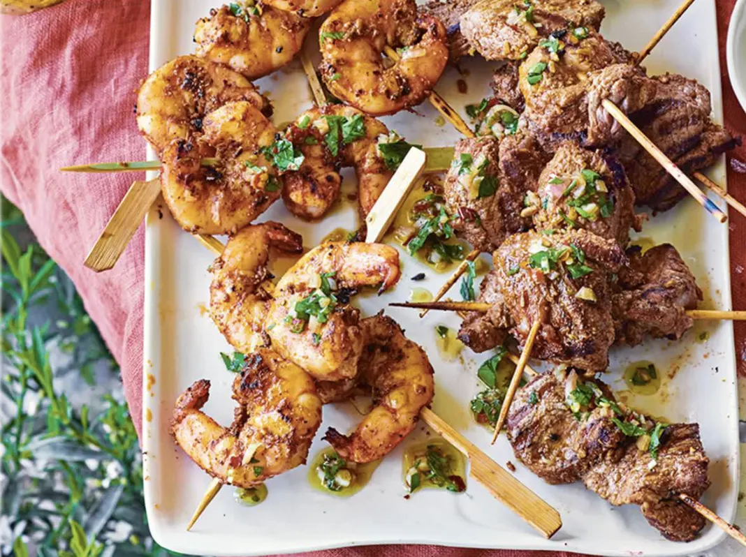 Lamb Kebabs & Prawns, Seasoned Rice, Roasted Veggies w/Yogurt-Cucumber Dip, Pita Lamb Kebabs & Prawns, Seasoned Rice, Roasted Veggies w/Yogurt-Cucumber Dip, Pita