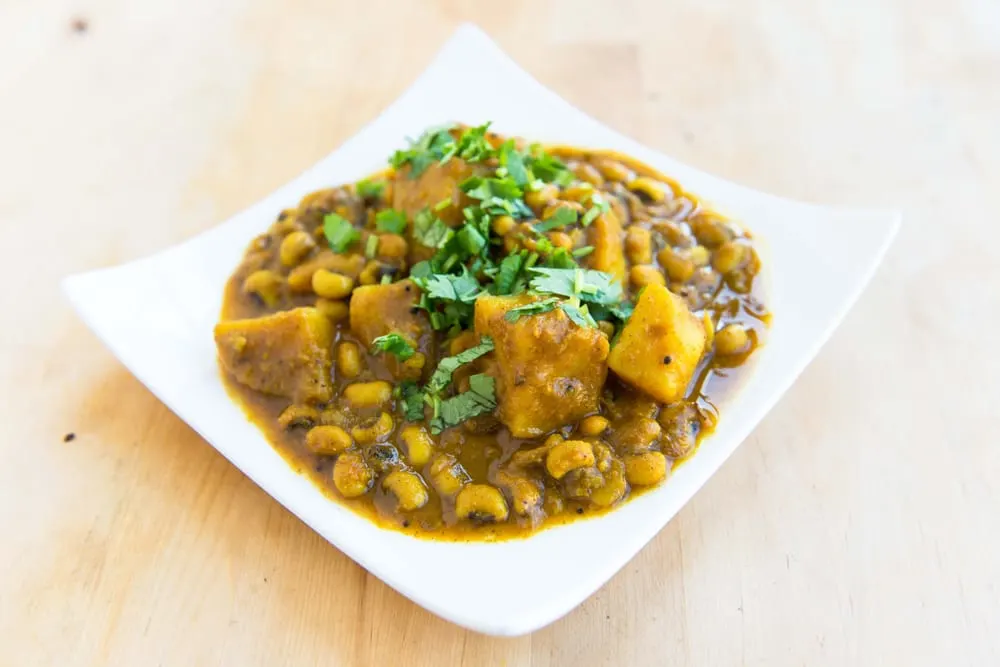 Black Eye and Potato Curry with Rice, Naan and Raita Black Eye and Potato Curry with Rice, Naan and Raita