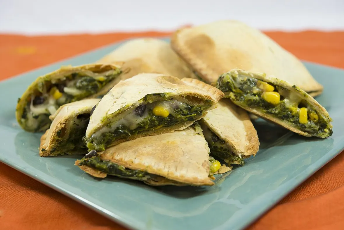 Vegetarian Jamacian Spinach Patty with Bell Peppers & Onions with Sauteed Kale