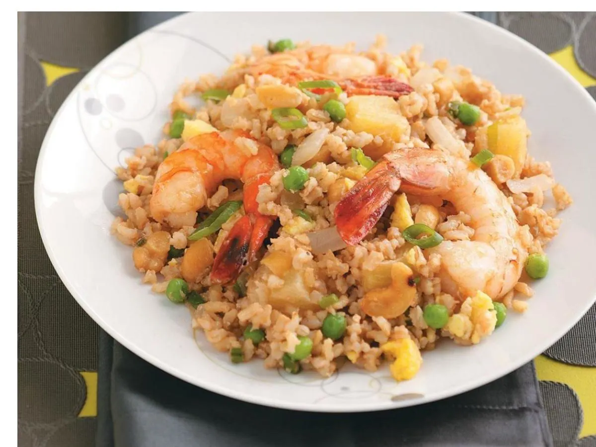 Pineapple Fried Rice with Mixed Seafood (Squid, Shrimp and Mussels) Pineapple Fried Rice with Mixed Seafood (Squid, Shrimp and Mussels)